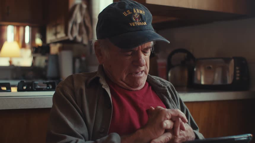 A man rubs his hurting hand