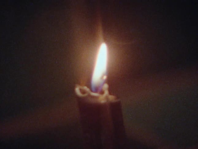 Close up of a lit candle