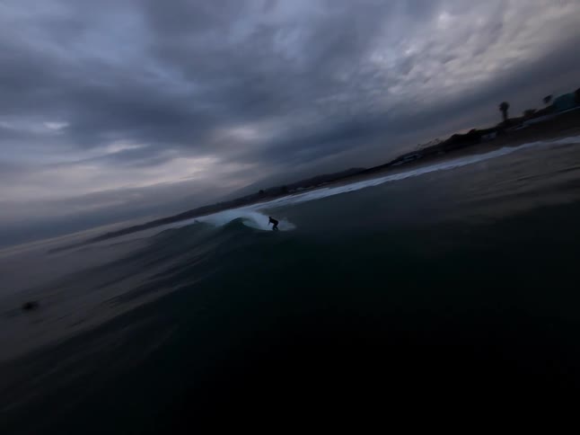 An image of a person surfing in the sea
