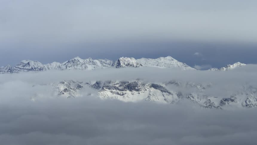 Clouds hovering in a wintry wonderland