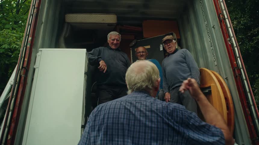 A clip of elderly men having a conversation