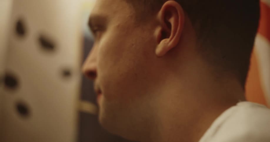 A close up clip of a mans head