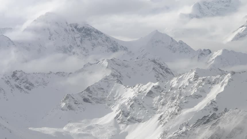 Snow covers mountain peaks