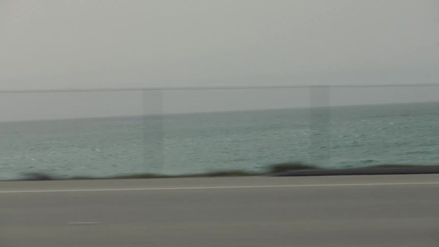 The ocean as seen from a car