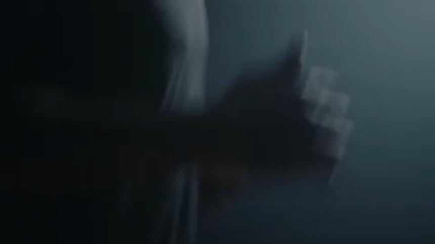 A man is running at night in the dark