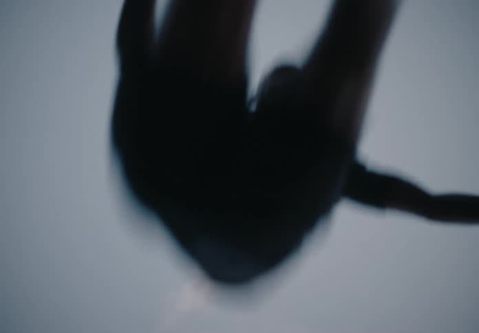 A man is running down a path