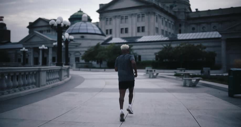A man jogs by the building