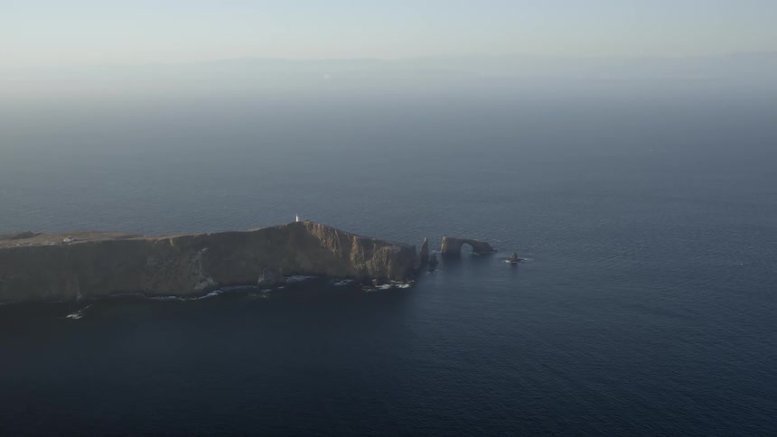 Aerial view of a peninsula jutting out into the water