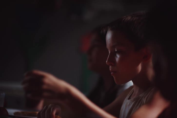 Children are eating and drinking inside