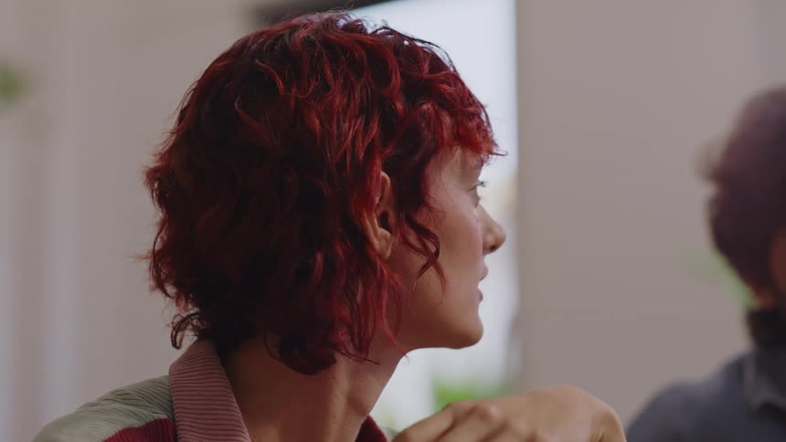 Man and woman sitting talking