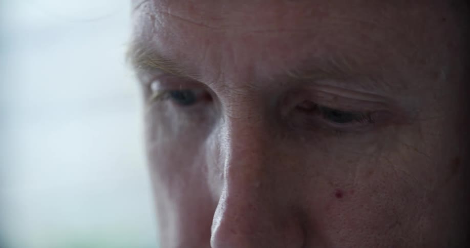 Close up of the eyes of a man focused on a task