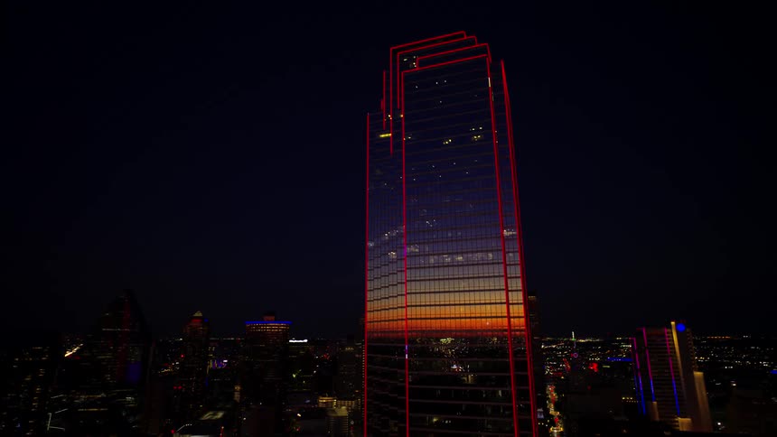 A large skyscraper at night