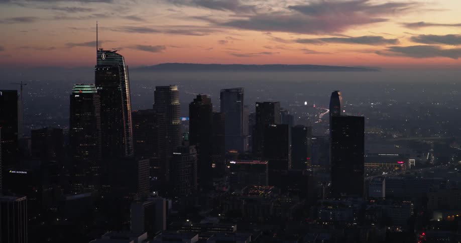 A city skyline at dusk