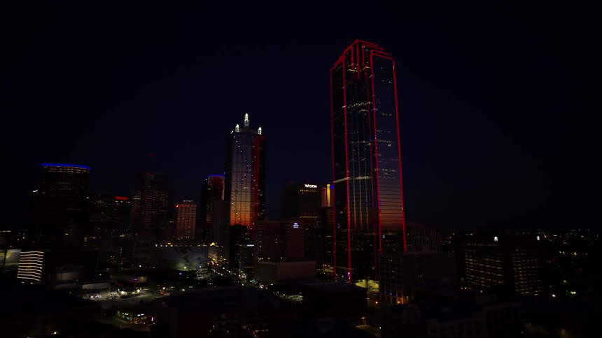 A large skyscraper at night