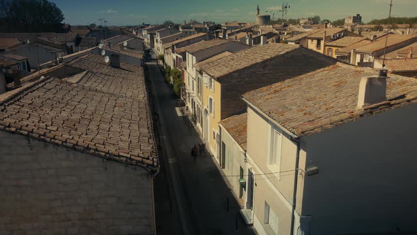 A clip of house rooftops in a community
