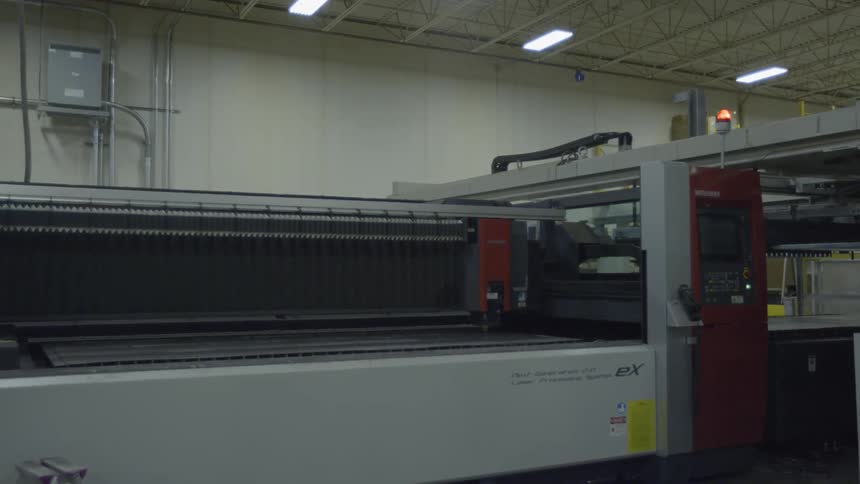 Machine running with a red blinking light atop it