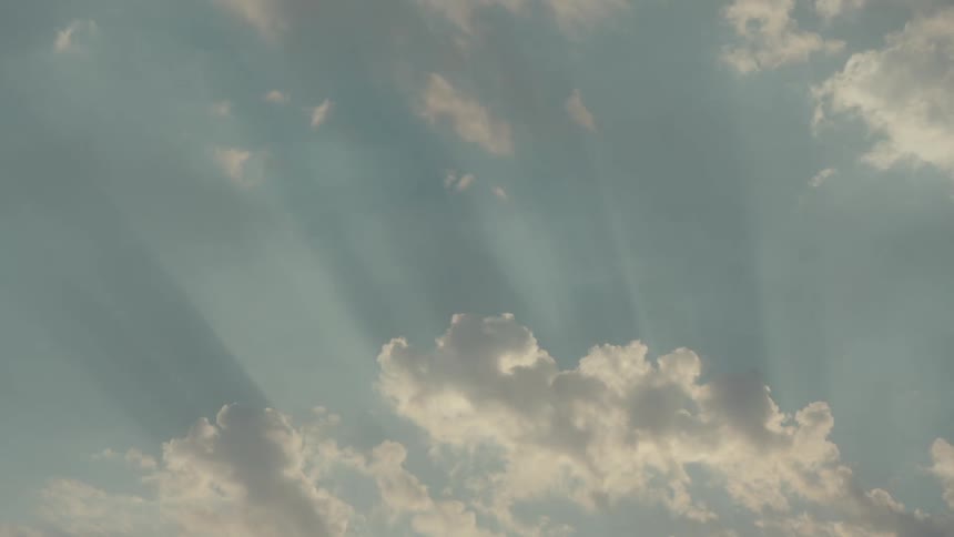 View of the sky with clouds and reflection of the sun