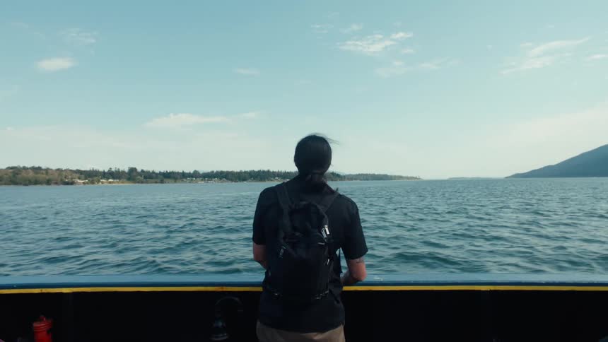 A man is riding in a boat