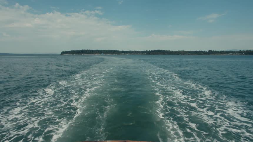Traces of a boat moving through the sea