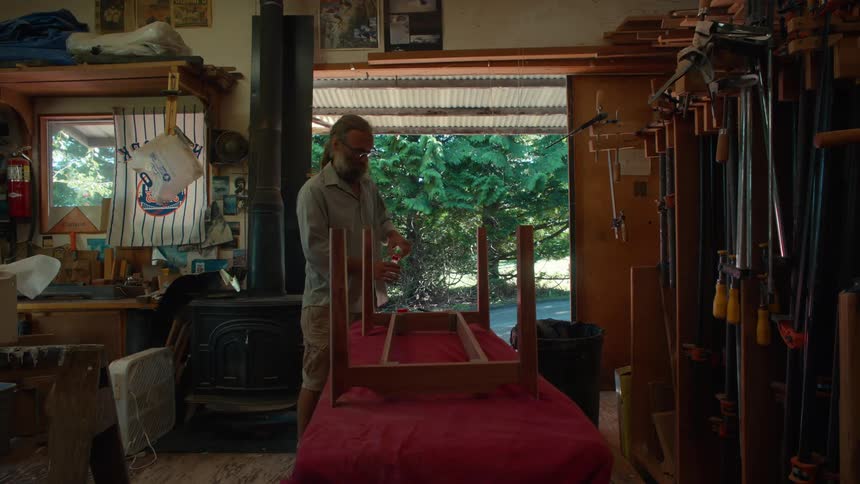 Carpenter man working in an indoor space