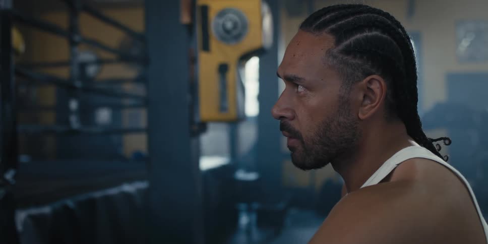 Fighter focused while in a gym