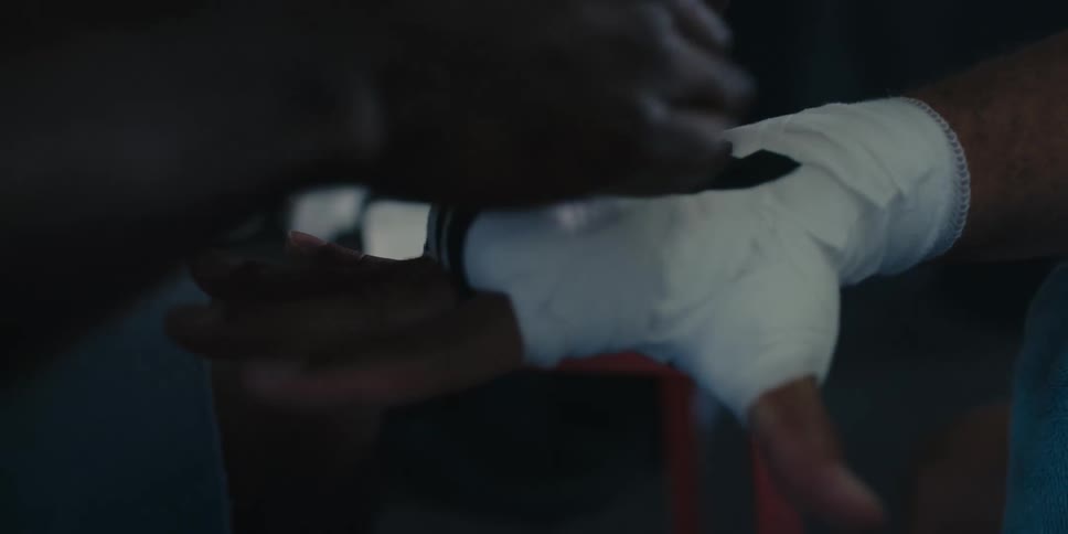 Hands of a fighter being bandaged