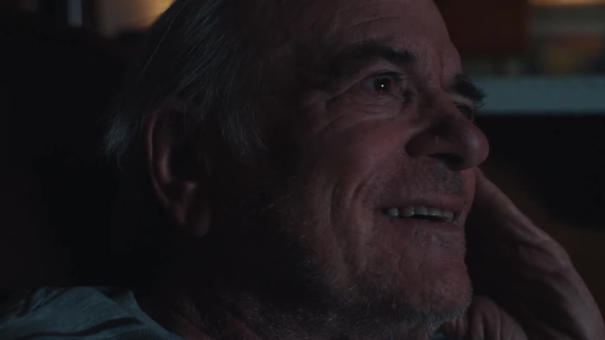 A clip of an happy elderly man