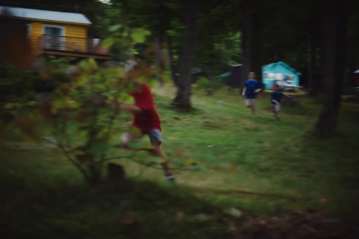 During an activity at camp a youth captures the opponents flag and runs