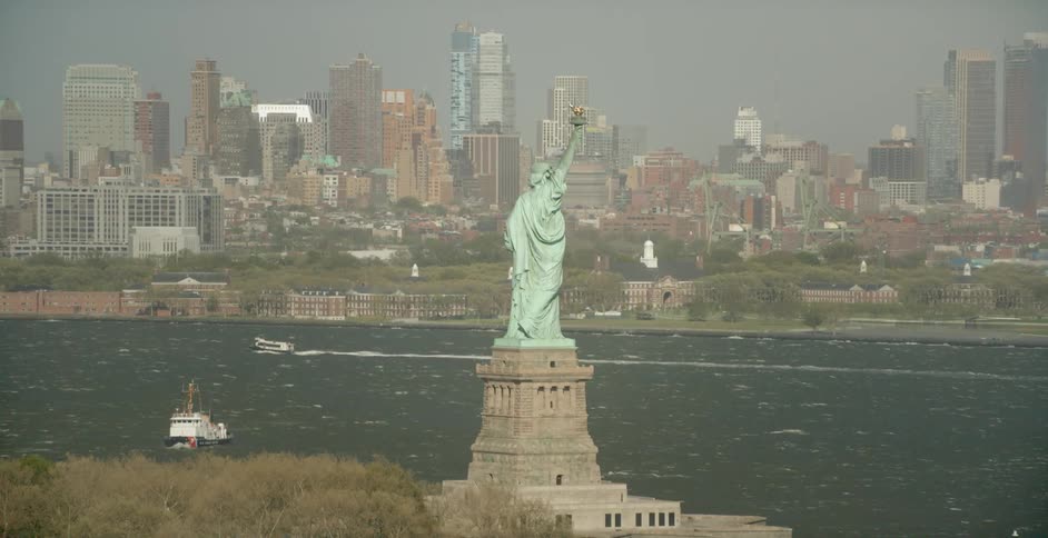 Statue of liberty in front of new york city