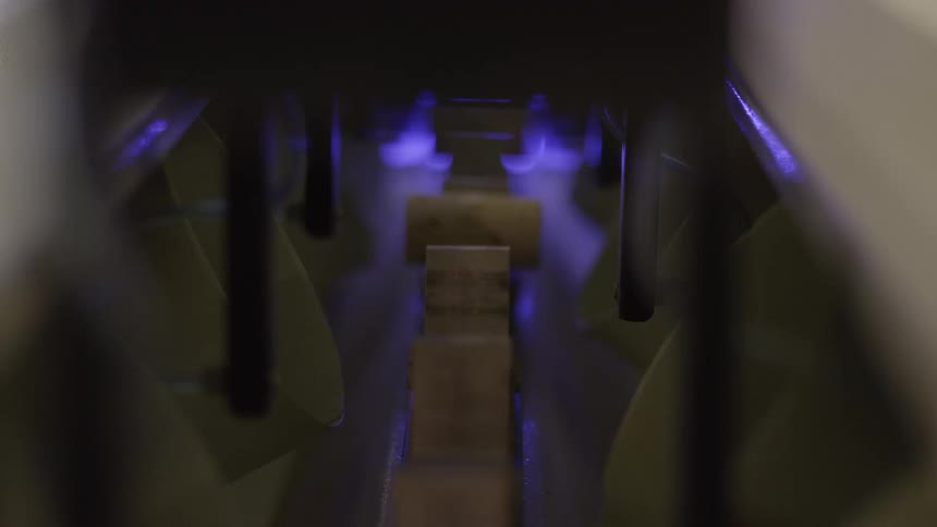 Corks passing through a machine in a factory