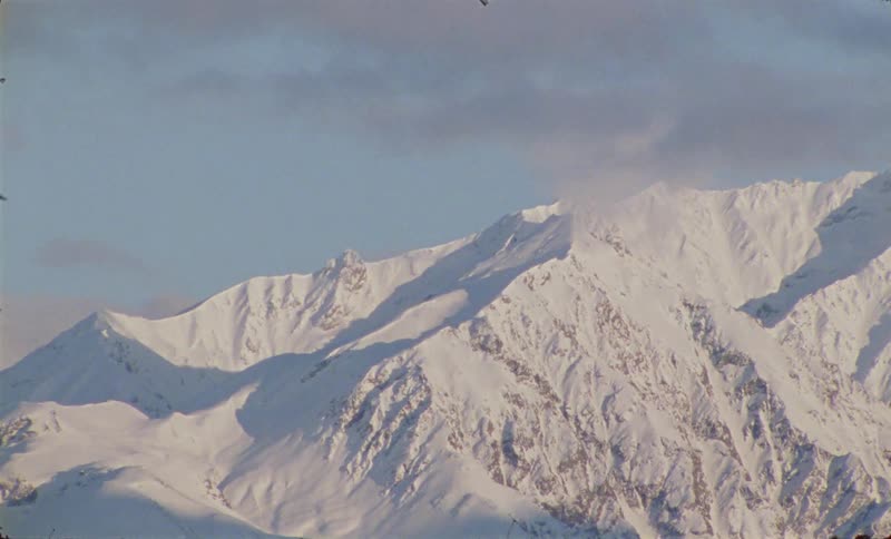 Landscape of a snowy mountain valley