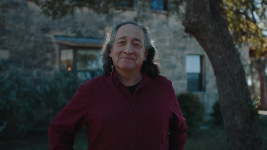 Portrait of an older Native-American man happy and smiling
