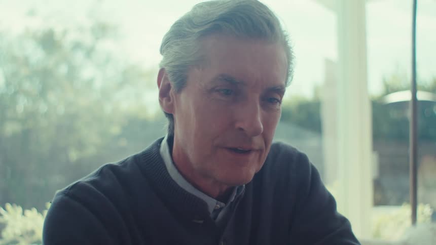 Portrait of a man sitting thoughtfully
