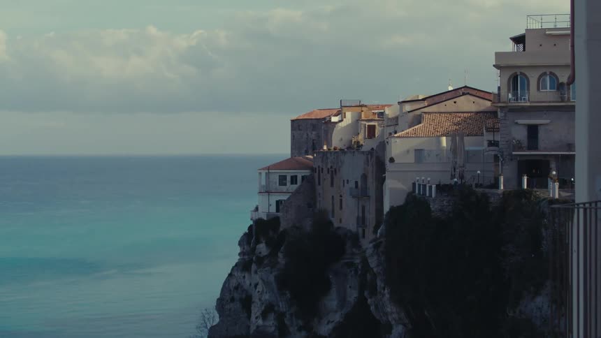 Classic houses on a hilly coast by the sea