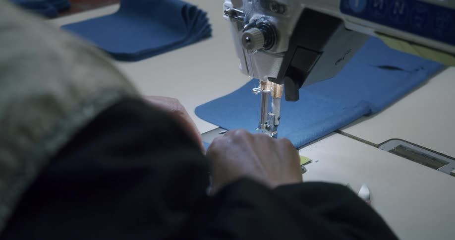 A clip of a person sewing
