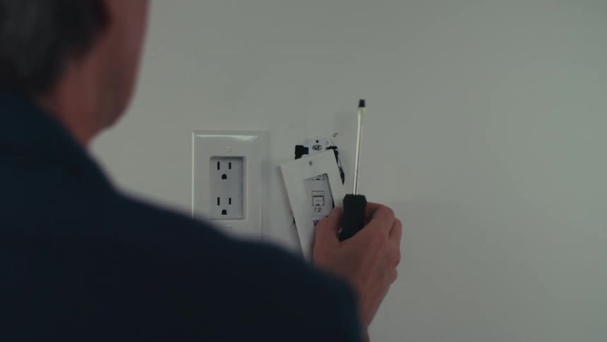 A clip of a person doing some electrical repair work