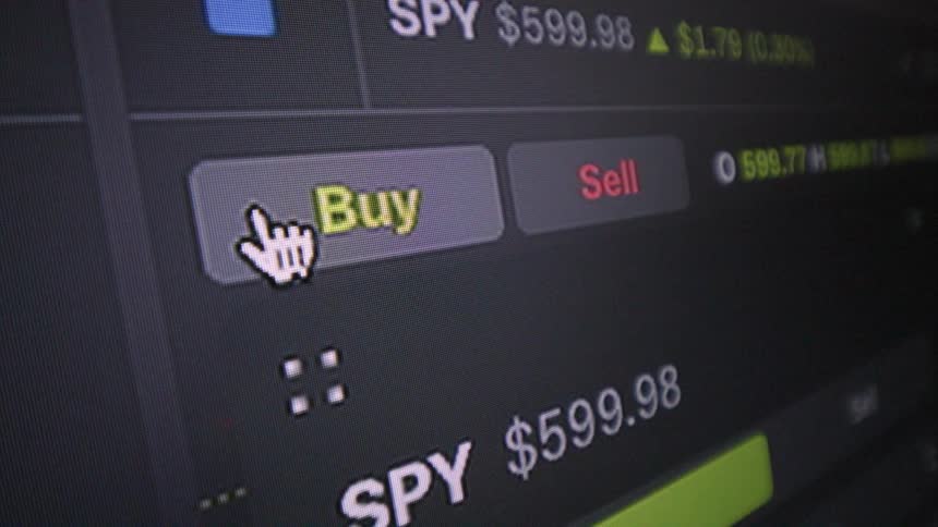 A trading interface where mouse moves towards buy button