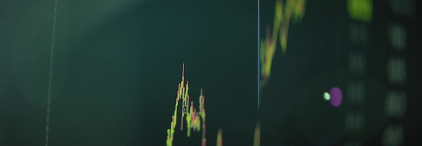 Closeup of a display containing a graph and a few spots of glare