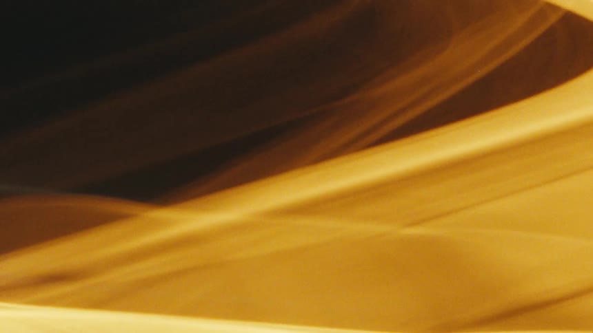 Abstract moving light against a dark background