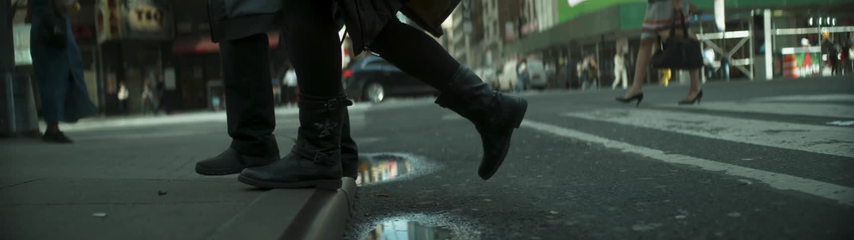 Pedestrians cross a city street