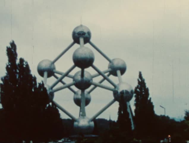 A tall art exhibit of connecting steel balls