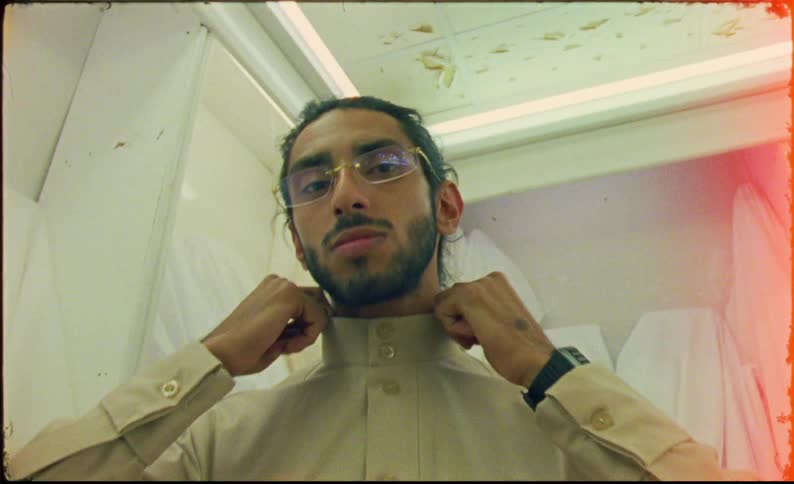 A clip of male and trying to dress up
