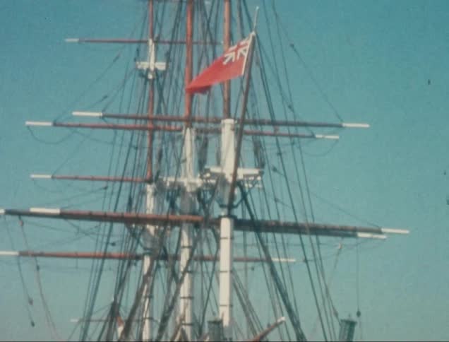 An old shipping vessel is docked