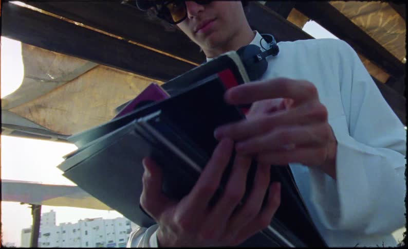 A man is flipping through records