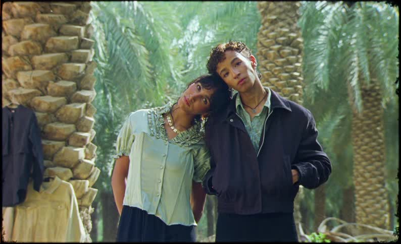 A clip of a male and female model posing for a picture