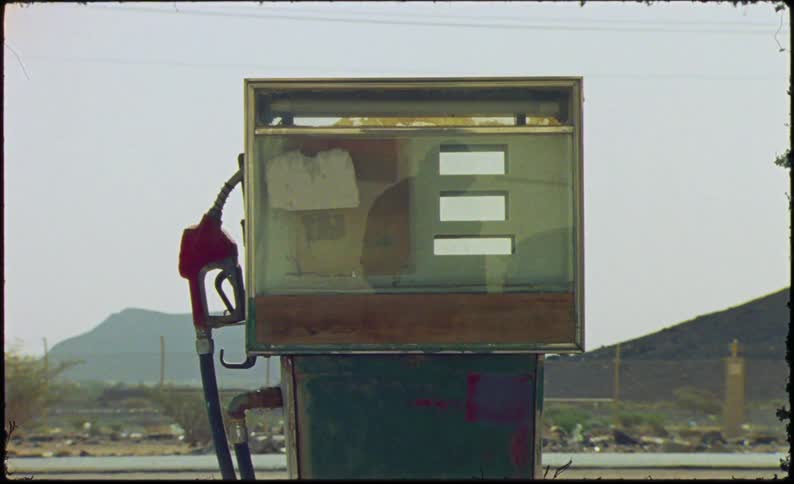 An old gas pump is in the lot