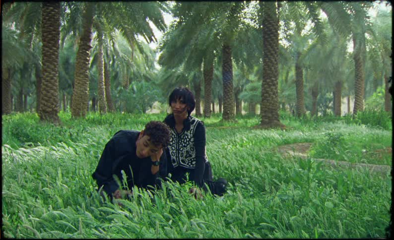 Models pose in the tall grass