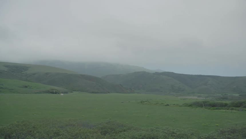 A green field lies ahead