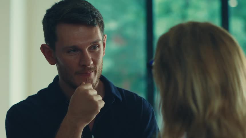 A man and a woman are talking
