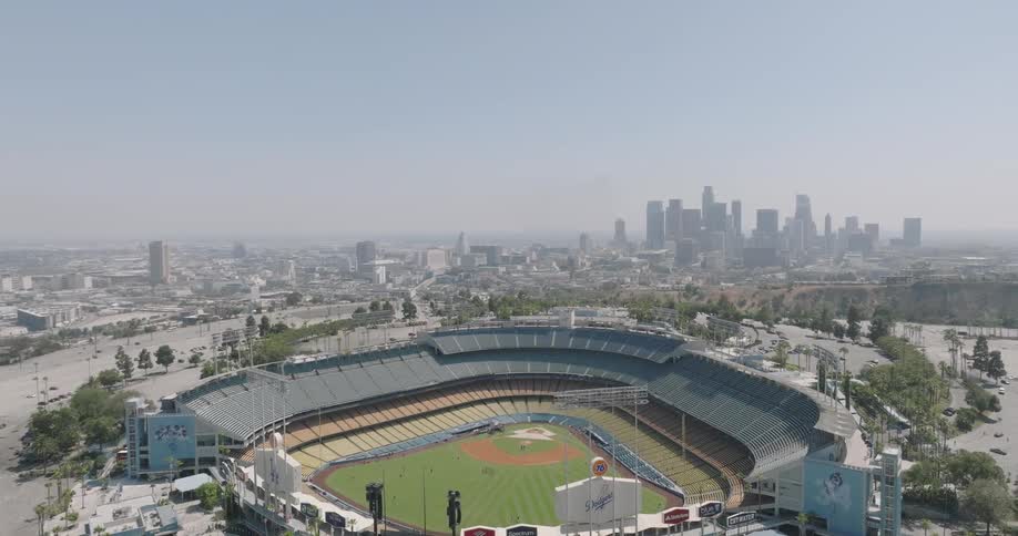 An aerial clip of a stadium in a city